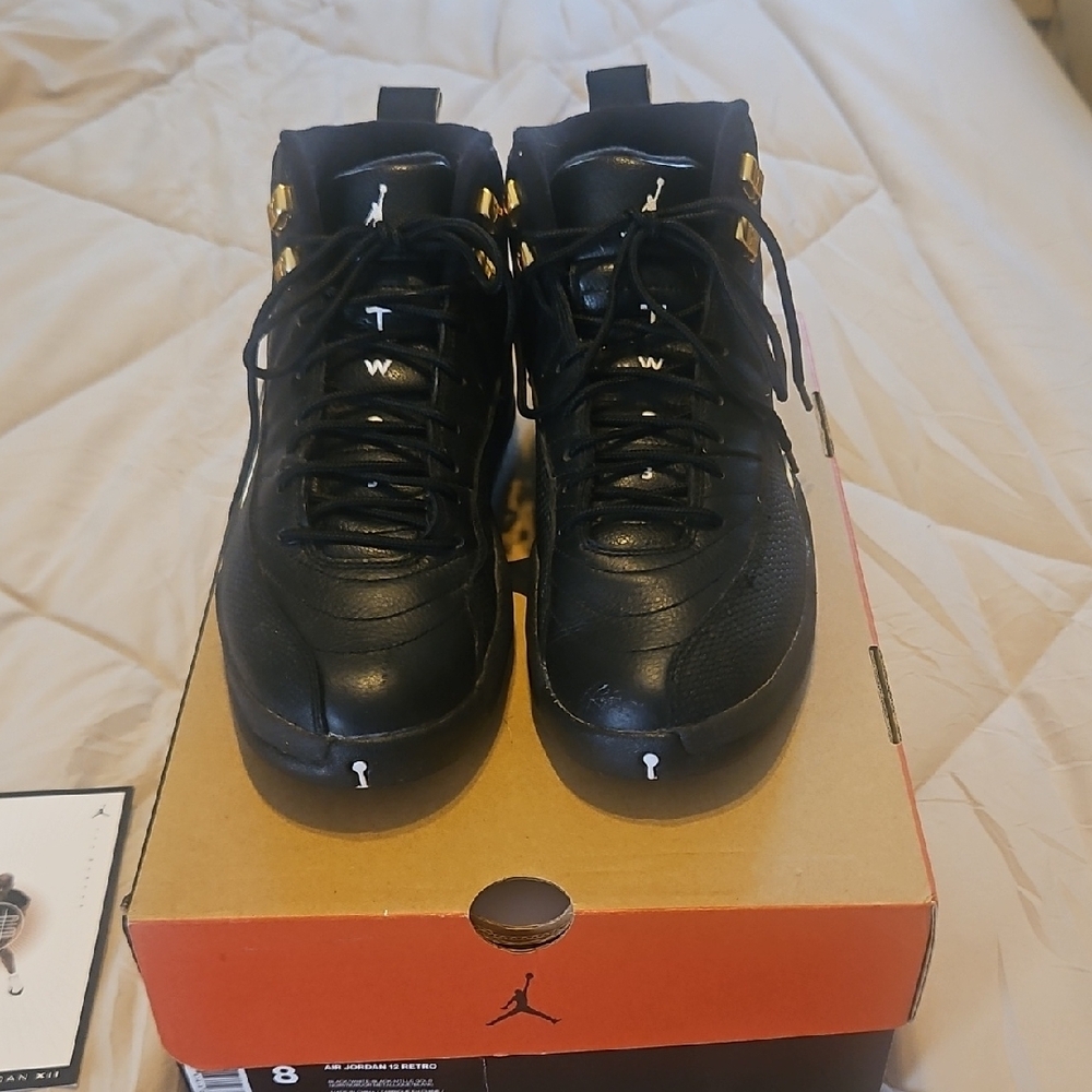 Jordan Black and Gold High-Top Sneakers. GUC with box. Make an offer.